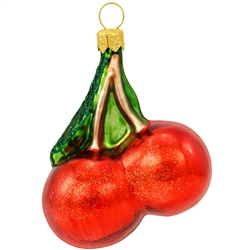 Ripe for the picking, these sweet cherries will add a taste-ful dimension to your holiday decor! With sparkling glitter accents and brilliant glazes of red, brown, and green, our charming 2" tall sweet cherries ornament is masterfully crafted of glass in