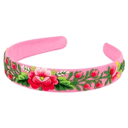 This is a flexible headband that has been covered in pink material that has been hand embroidered in a Lowicz style floral pattern. Made in Lowicz, Poland. No two are alike. Picture shows for examples. Price is for one headband.