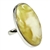 A beautiful custard color amber cabochon framed in a classic sterling silver frame. Size is approx 1.25 x .75".