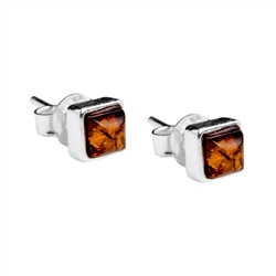Baltic Amber stud earrings with Sterling Silver detail.  Size is approx  5mm square.
