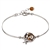 This sterling silver bracelet features a ladybug center of honey amber and silver. Size is 7.5" diameter with a 1" extender.