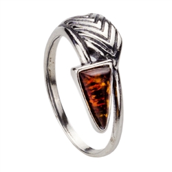 A Sterling Silver Arrow band with a cognac amber head.