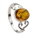 An oval of honey Baltic amber set between Sterling Silver Celtic hearts