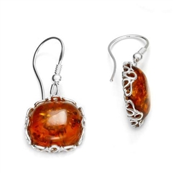 Gorgeous Baltic Amber earrings framed in Sterling Silver. Size is approx .5" square.