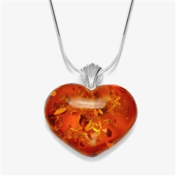 Beautifully shaped honey amber heart with a sterling silver finding.  Size is approx 1.4" H x 1.25" L X .5" W.  Weighs approx 7.5 grams.  &#8203;Please note that silver chain is NOT included.