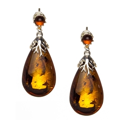 Beautiful honey amber and sterling silver stud earrings. Size is approx 1.5" x .5"
