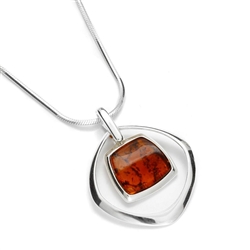 Artistic Framed Honey Amber And Silver Pendant  1.25"