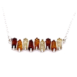 Beautiful sterling silver ncklace decorated with multi-color amber cabochons and with an adjustable 18" - 20" sterling silver chain.