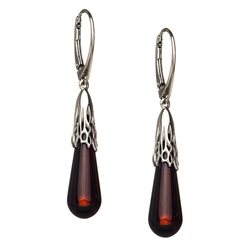 Classic tear drop shaped cherry amber supended in sterling silver.  European stye silver hooks. Size is approx 1.75" x .3"