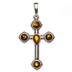 Sterling silver cross highlighted with Baltic Amber  Size is approx 1.5" x 0.75"