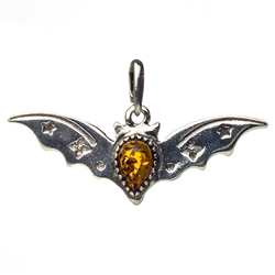 Amber centerpiece highlights this flying bat sterling silver pendant. Size is approx 0.75" high x 1.75" wide.