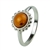 Honey amber set in a classic sterling silver setting.  The center piece is approx 0.4" diameter.