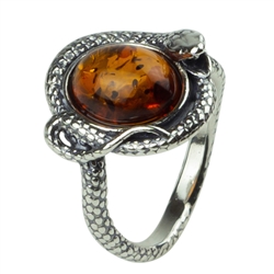 Sterling silver snake coiled around an oval amber cabochon.  Amber size is approx  is approx 0.25" x 0.4".