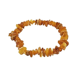 Small Antique-color amber chip set on elastic cord. Genuine Baltic amber. Approx 6.75" before stretching.