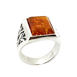 Rectangle shaped amber stone set in .925 sterling silver. Genuine Baltic amber. Front size is approx. 0.5" x 0.6".