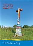 Beautiful 12 month calendar featuring full color photos of Polish wayside shrines. 
&#8203;US. format - Sunday is the first day of the week with Saint's names days listed in Polish language. Size 8" x 11.5"