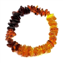 Rainbow Amber Stretch Bracelet. Amber chips are set on an elastic cord. Genuine Baltic amber. Approx 6.75" before stretching.