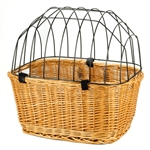 Small animal carrier of natural Polish wicker with a metal frame . Size is approx 17" H x 17.5" L x 13" W. Perfect for carrying pets up to 20 lbs. The carrier is closed with a metal grill for safety and secured with a velcro strap. Simply mount it on to