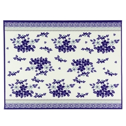 Large Polish cloth placemat featuring Polish stoneware colors and floral design. This is a thin material made of 100% polyester. Made in Poland.  Size is 15.25" x 11.75"