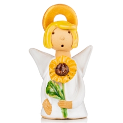 Our beautiful little ceramic angel is holding a beautiful sunflower. Totally hand made and painted in Poland. Stamped and artist initialed on the bottom. No two angels are exactly alike as they are all hand made and painted.