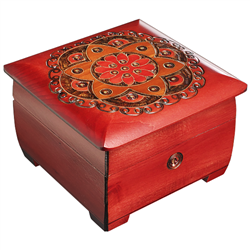 Large square trunk with Chakra design with a Red base coat & Orange accents. Features legs, brass inlay, and lock with key. Size is approx 6.25" x 6.25" x 4".