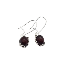 Cherry Amber / Flower Design Silver Dangle Earrings. Oval-shape amber stones set in a.925 sterling silver. Amber earrings on silver hooks. Size is approx 0.8" x 0.25"