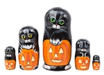 Five black kitties wait for trick-or-treaters, purring contentedly alongside their jack-o-lanterns. This Halloween nesting doll will be the purrfect October gift for the cat lover who enjoys decorating for the fall season. Nesting doll collectors will pri
