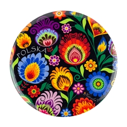 Delightful Polish paper cut designs on a button with a magnet on the back. Shiny plastic coated surface to protect the design. The word Polska (Poland) is part of the design.