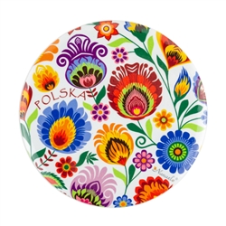 Delightful Polish paper cut designs on a button with a magnet on the back. Shiny plastic coated surface to protect the design. The word Polska (Poland) is part of the design.