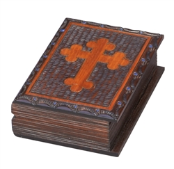 This beautiful wooden box is made to look like a book. A cross adorns the lid. Two-toned wood stains complete the piece. Handmade in Poland's Tatra Mountain region. Size is approx 5" x 3.75" x 2".