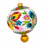 This ornament is hand painted and was expertly crafted of glass in Poland and measures approximately 5.5" tall x 4" wide.  This is a beautiful Polish paper cut (wycinanki) style design from the Lowicz region of central Poland.