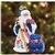 Santa is looking festive as ever in a cozy ensemble fashioned in the style of Polish floral folk art from the Lowicz region of central Poland. Uniquely colorful using a combination of hand-painting with decoupage elements, this piece is a truly beautiful
