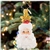 This clever Christmas ornament features two classic icons of the holiday season â€“ a smiling Santa Claus and a tastefully-trimmed tree! This lovely Little Gem can be appreciated from all angles.
DIMENSIONS: 3.5 in (H) x 2 in (L) x 1.5 in (W)