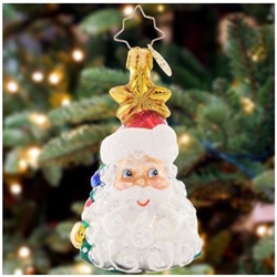 This clever Christmas ornament features two classic icons of the holiday season â€“ a smiling Santa Claus and a tastefully-trimmed tree! This lovely Little Gem can be appreciated from all angles.
DIMENSIONS: 3.5 in (H) x 2 in (L) x 1.5 in (W)