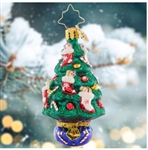 This tasty tree is trimmed with candy canes and gift-stuffed stockings â€“ what a cute little treat to celebrate the holidays!
DIMENSIONS: 3.5 in (H) x 1.75 in (L) x 1.75 in (W)