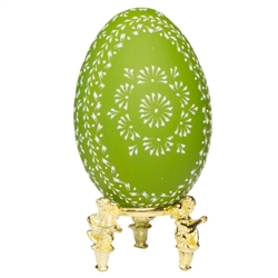 This beautifully designed egg is dyed one color then wax is melted and applied to form an intricate design which is left on the surface. The egg is emptied. Stand not included.
