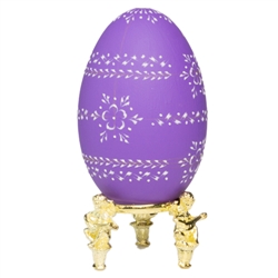 This beautifully designed egg is dyed one color then wax is melted and applied to form an intricate design which is left on the surface. The egg is emptied. Stand not included.