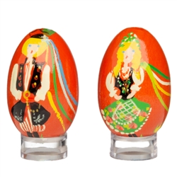 Deluxe wooden chickn egg size Easter eggs from Poland. Hand painted set featuring Krakow boy and girl in their colorful traditional costumes. Costumes details will vary slightly.
Note: Stands sold separately.