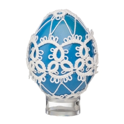 This beautifully designed chicken egg is painted and surrounded in a tatted design. Stand sold separately.