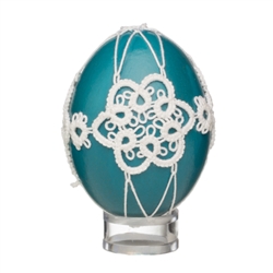 This beautifully designed chicken egg is painted and surrounded in a tatted design. Stand sold separately.