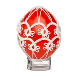 This beautifully designed chicken egg is painted and surrounded in a tatted design. Stand sold separately.