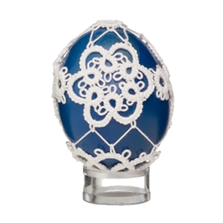 This beautifully designed chicken egg is painted and surrounded in a tatted design. Stand sold separately.
