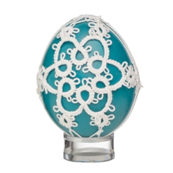 This beautifully designed chicken egg is painted and surrounded in a tatted design. Stand sold separately.