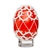 This beautifully designed chicken egg is painted and surrounded in a tatted design. Stand sold separately.