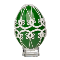 This beautifully designed chicken egg is painted and surrounded in a tatted design. Stand sold separately.