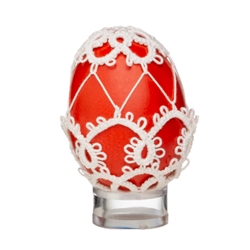 This beautifully designed chicken egg is painted and surrounded in a tatted design. Stand sold separately.