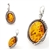 Oval shaped cognac color amber stone in leaf design .925 sterling silver setting. Natural Baltic amber pendant.  Size Approx 1" x 0.5""