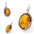 Oval shaped cognac color amber stone in leaf design .925 sterling silver setting. Natural Baltic amber pendant.  Size Approx 1" x 0.6"