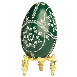 This beautifully designed egg is dyed one color then wax is melted and applied to form an intricate design which is left on the surface. The egg is emptied. Stand not included.