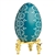 This beautifully designed egg is dyed one color then wax is melted and applied to form an intricate design which is left on the surface. The egg is emptied. Stand not included.